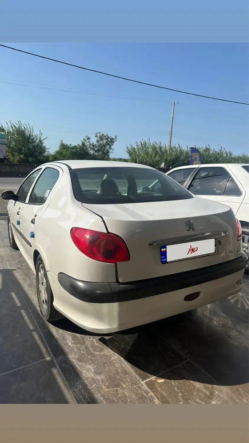 پژو ۲۰۶ صندوق دار v8 - 1394
