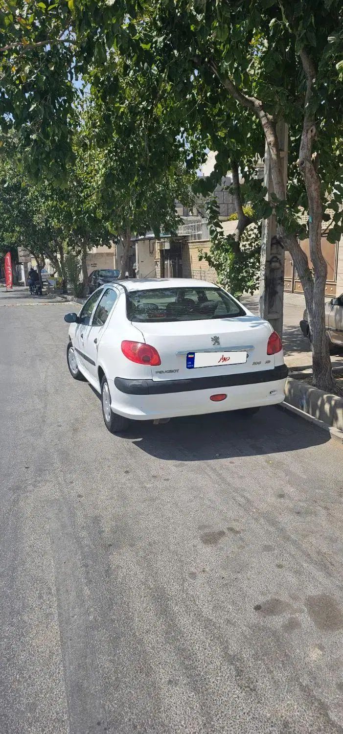 پژو ۲۰۶ صندوق دار v8 - 1395
