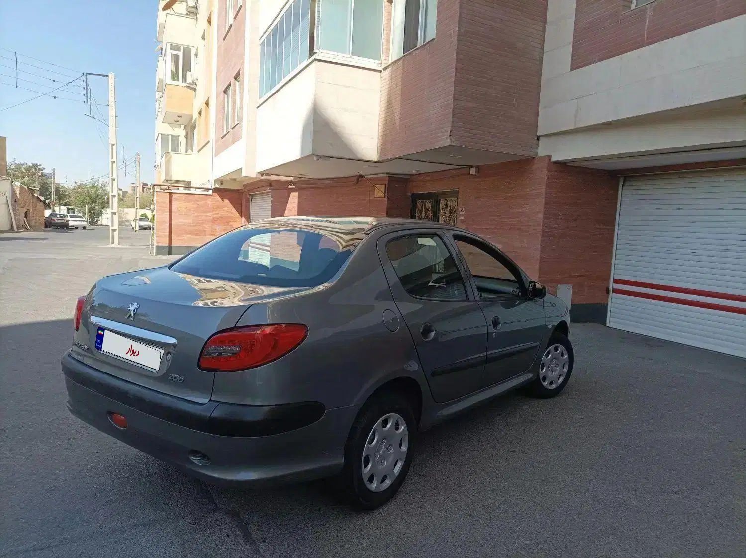 پژو ۲۰۶ صندوق دار v8 - 1395