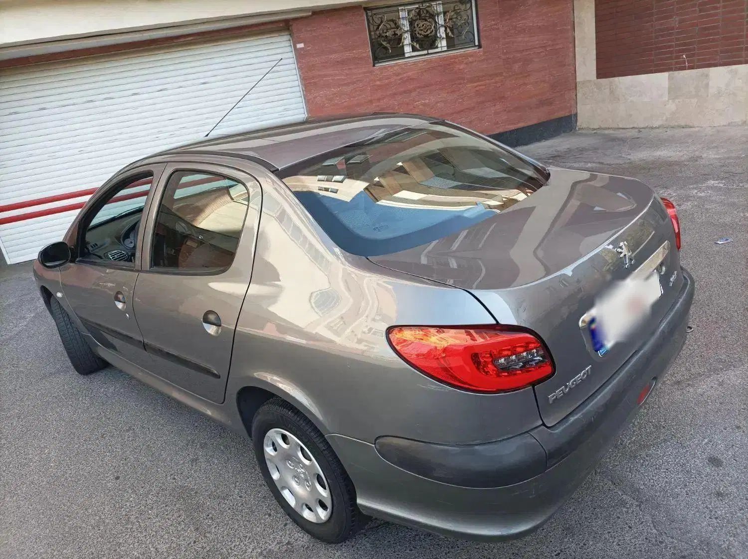 پژو ۲۰۶ صندوق دار v8 - 1395