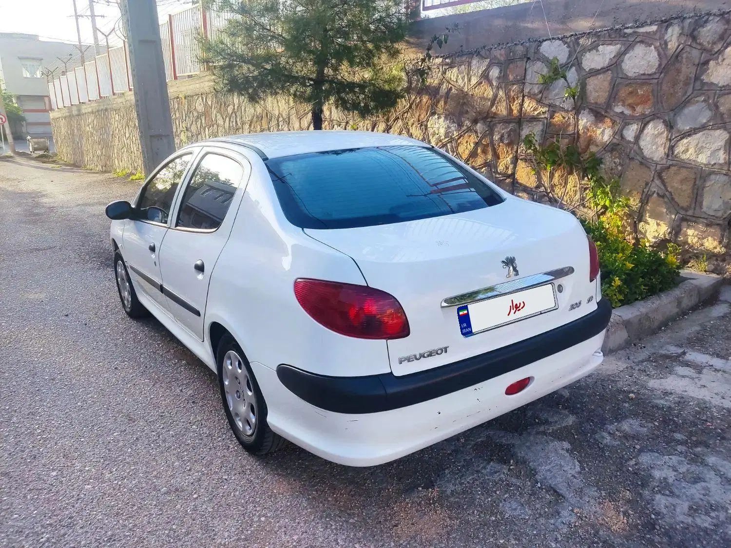 پژو ۲۰۶ صندوق دار v8 - 1399