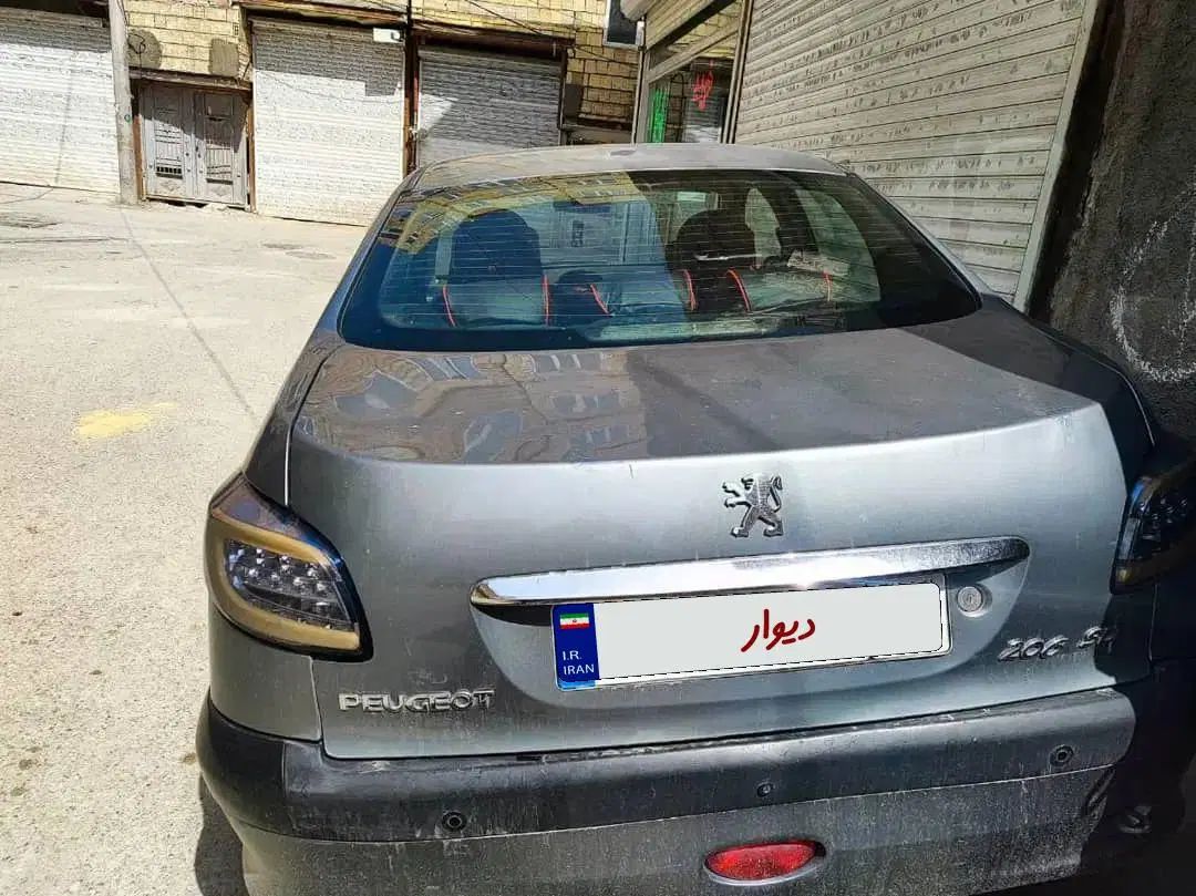 پژو ۲۰۶ صندوق دار v8 - 1395