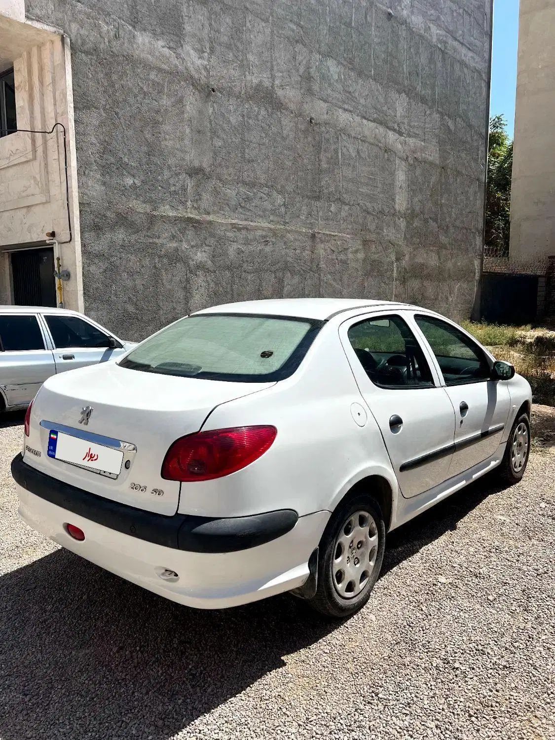 پژو ۲۰۶ صندوق دار v8 - 1394