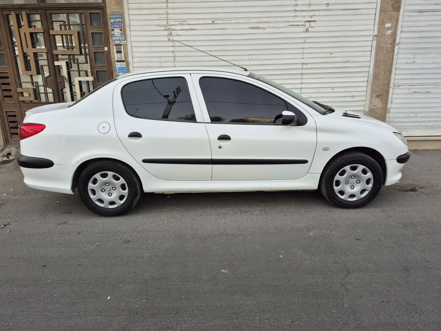 پژو ۲۰۶ صندوق دار v8 - 1396