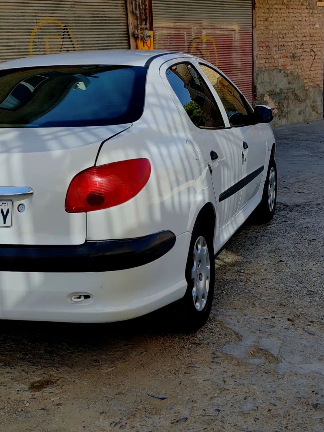 پژو ۲۰۶ صندوق دار v8 - 1391