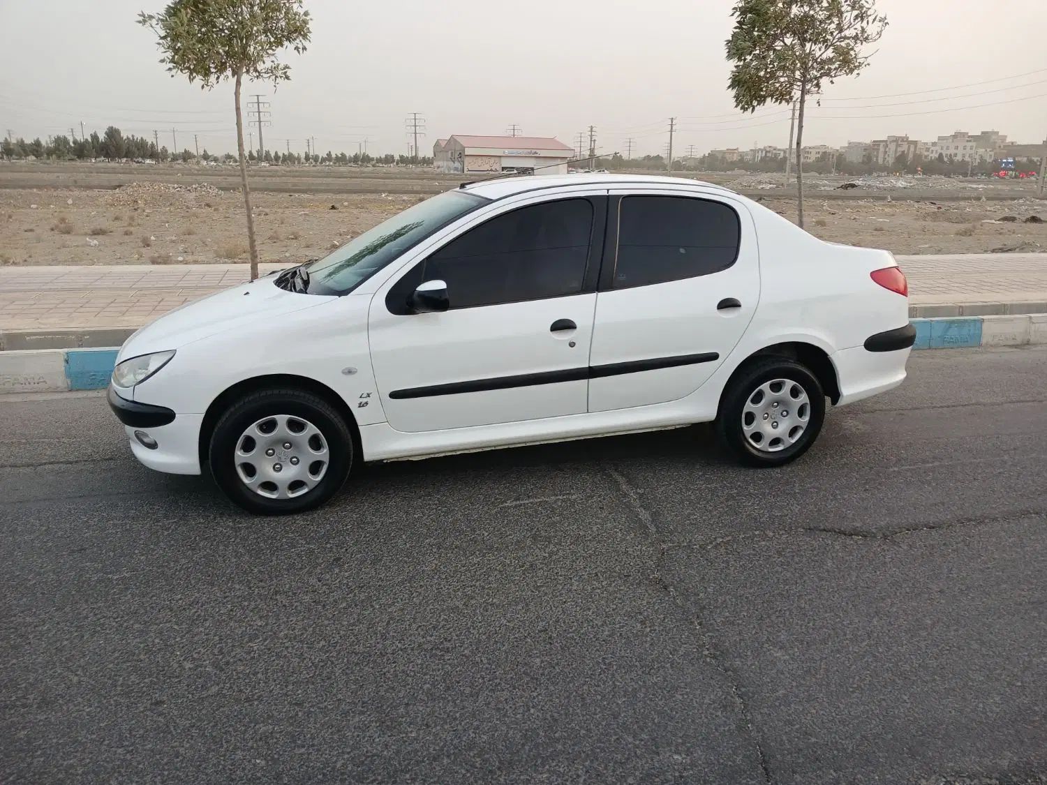 پژو ۲۰۶ صندوق دار v8 - 1396