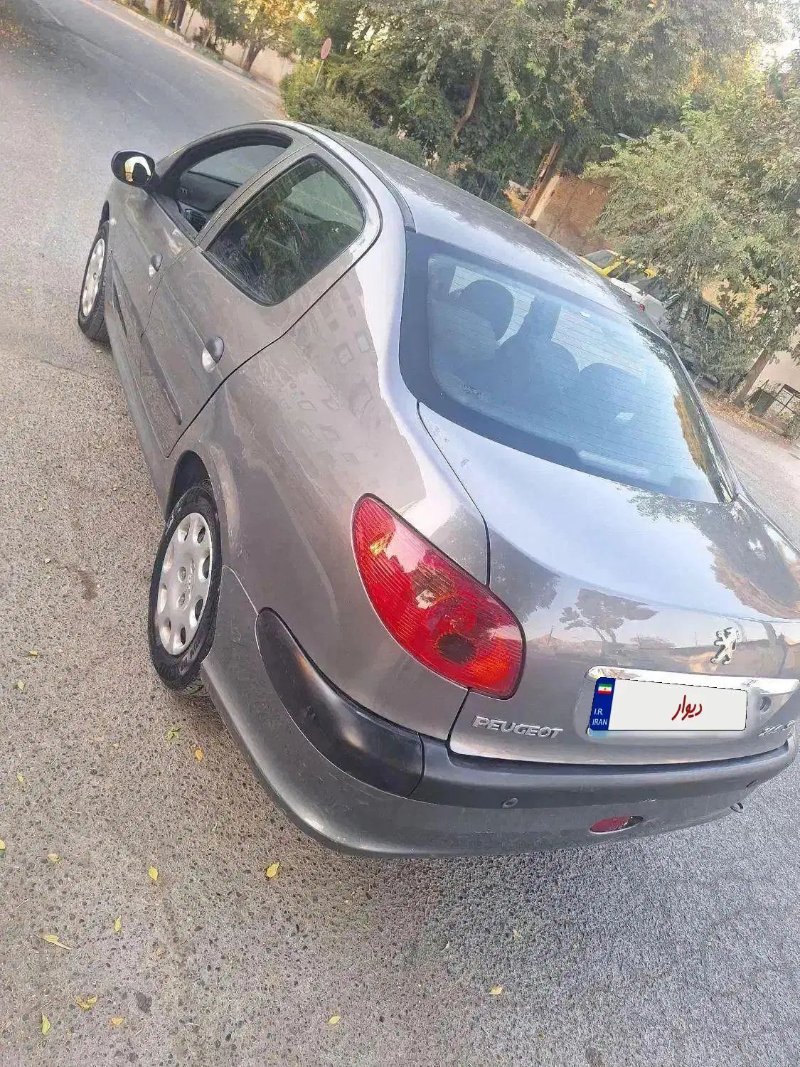 پژو ۲۰۶ صندوق دار v8 - 1395