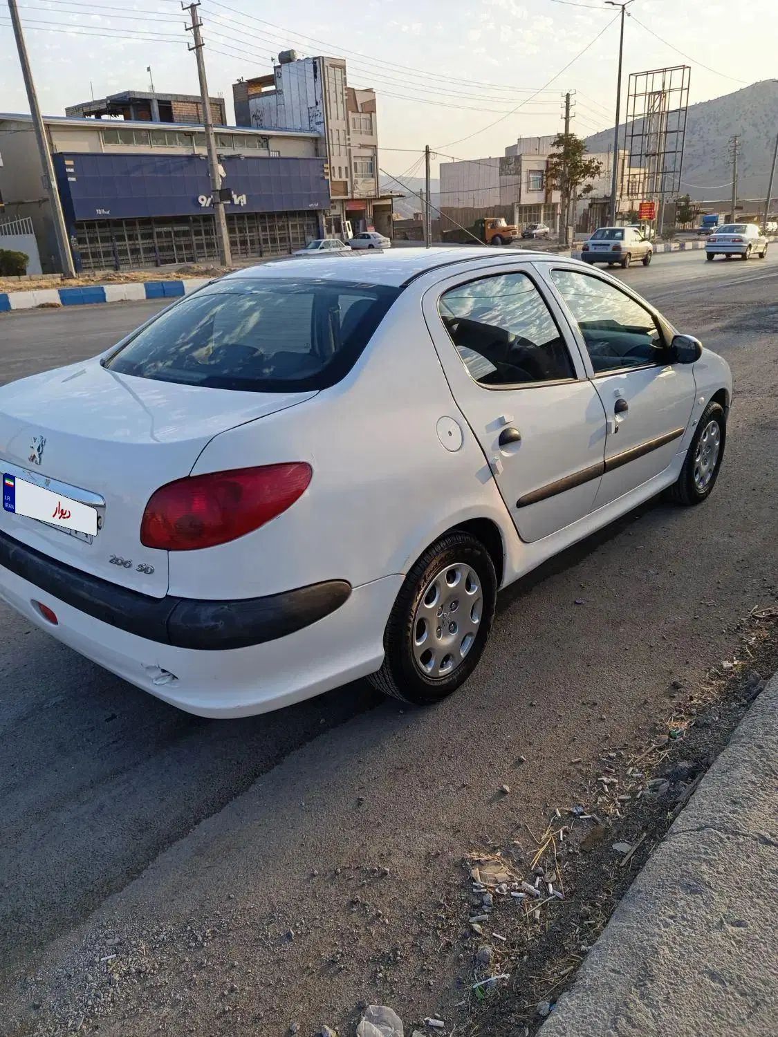 پژو ۲۰۶ صندوق دار v8 - 1394
