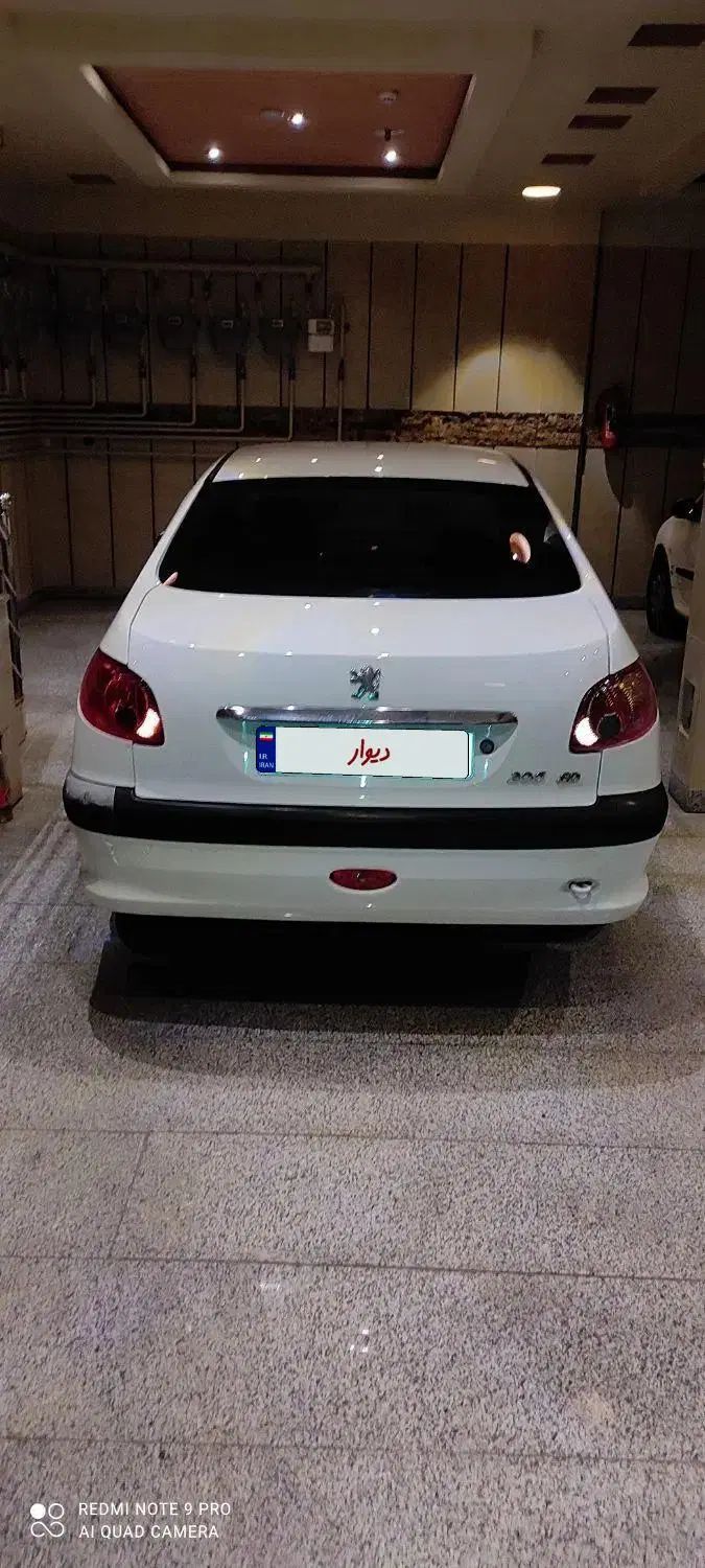 پژو ۲۰۶ صندوق دار v8 - 1391