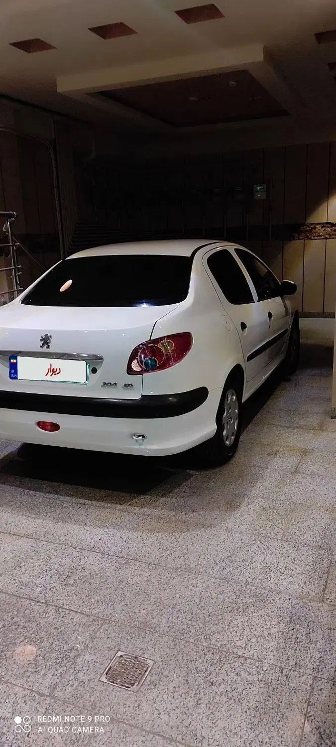 پژو ۲۰۶ صندوق دار v8 - 1391