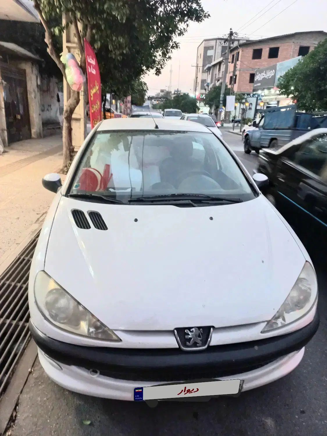 پژو ۲۰۶ صندوق دار v8 - 1397