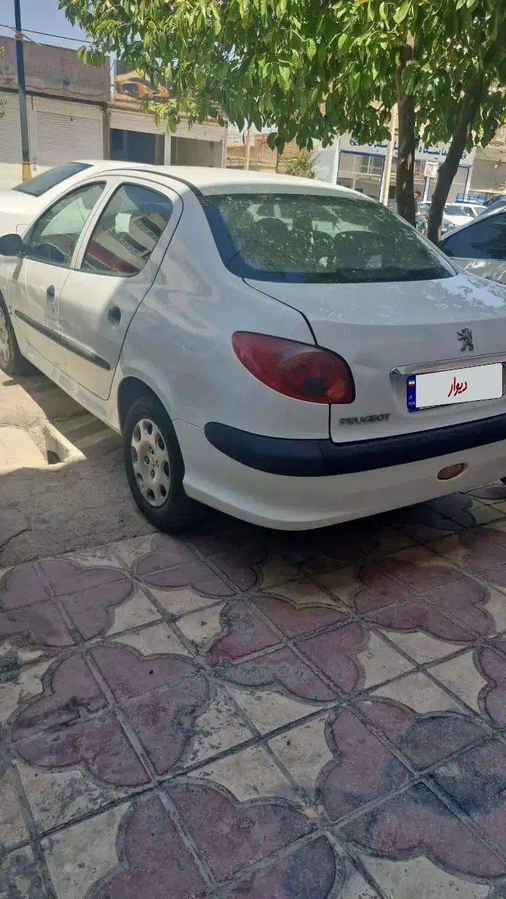 پژو ۲۰۶ صندوق دار v8 - 1395