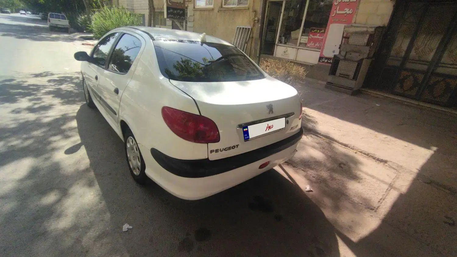 پژو ۲۰۶ صندوق دار v8 - 1394