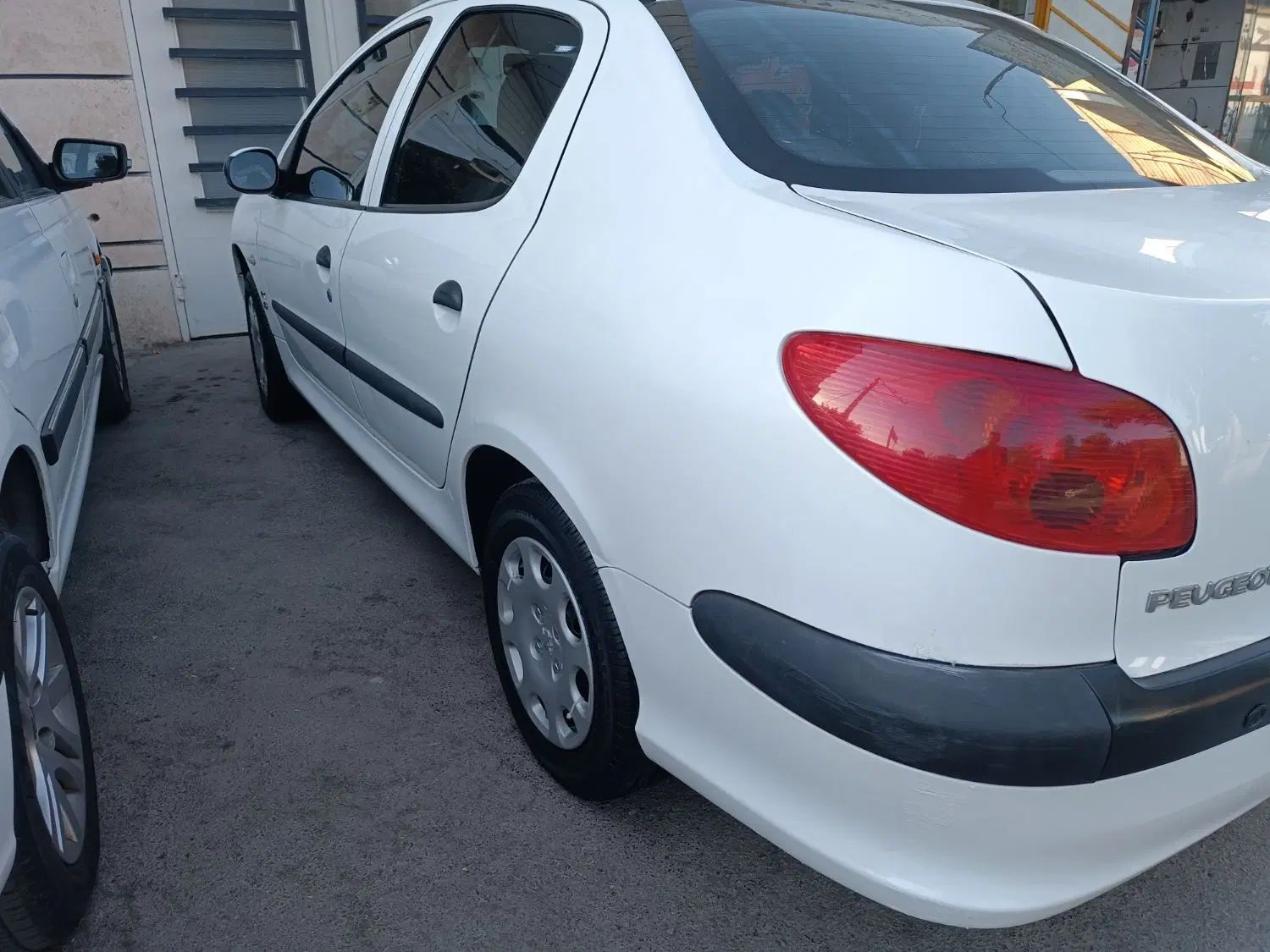پژو ۲۰۶ صندوق دار v8 - 1396