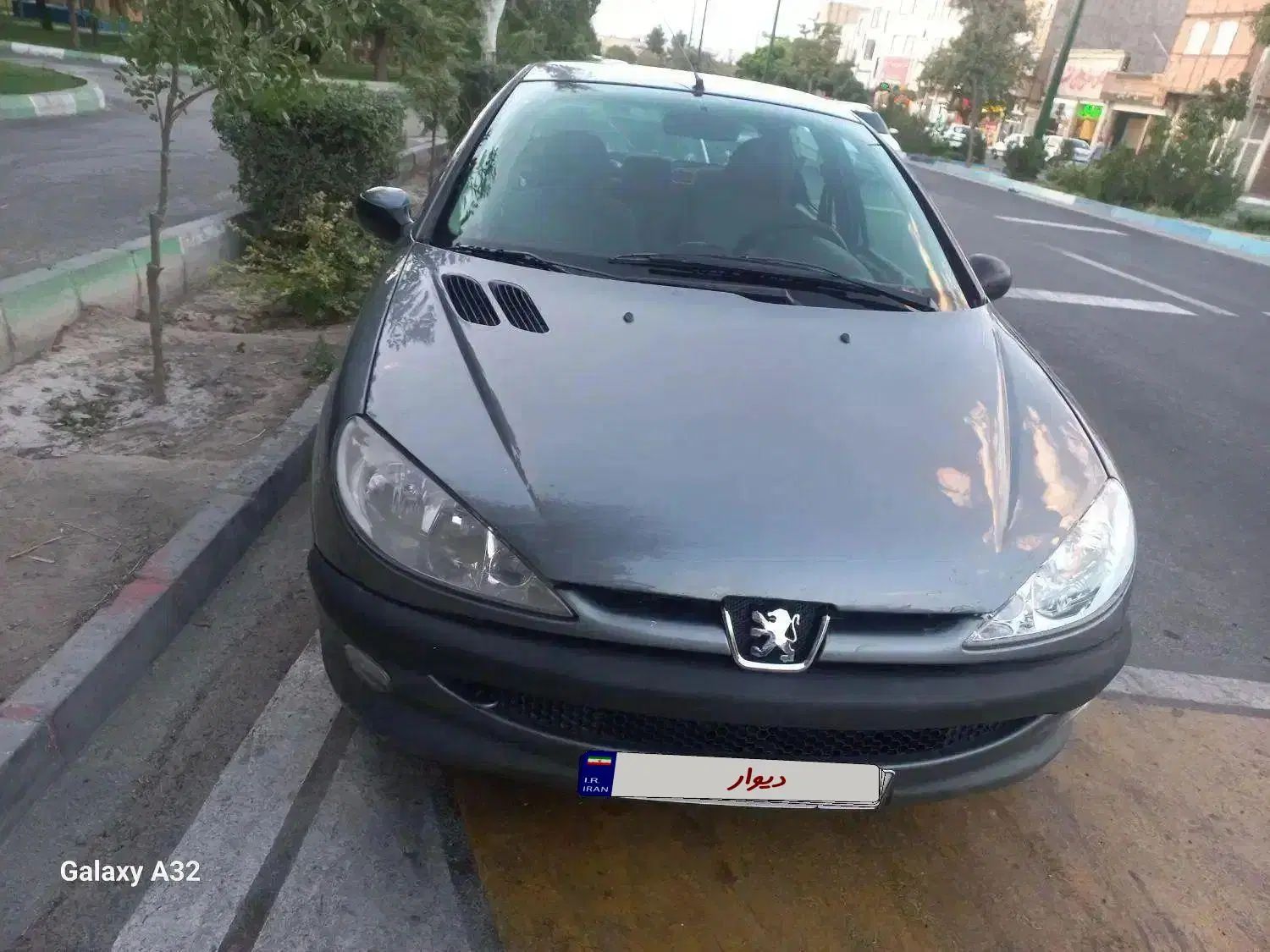 پژو ۲۰۶ صندوق دار v8 - 1395