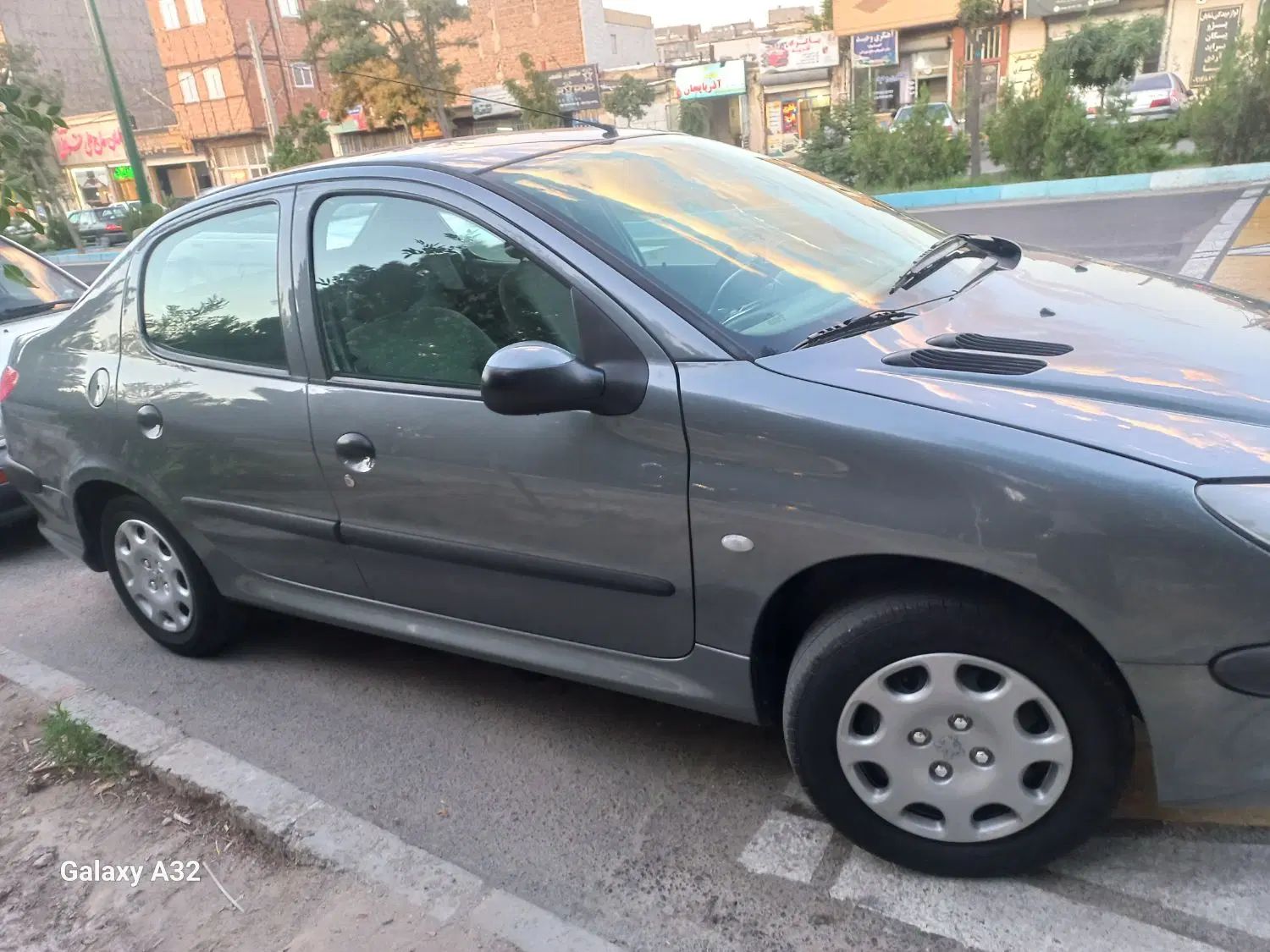 پژو ۲۰۶ صندوق دار v8 - 1395