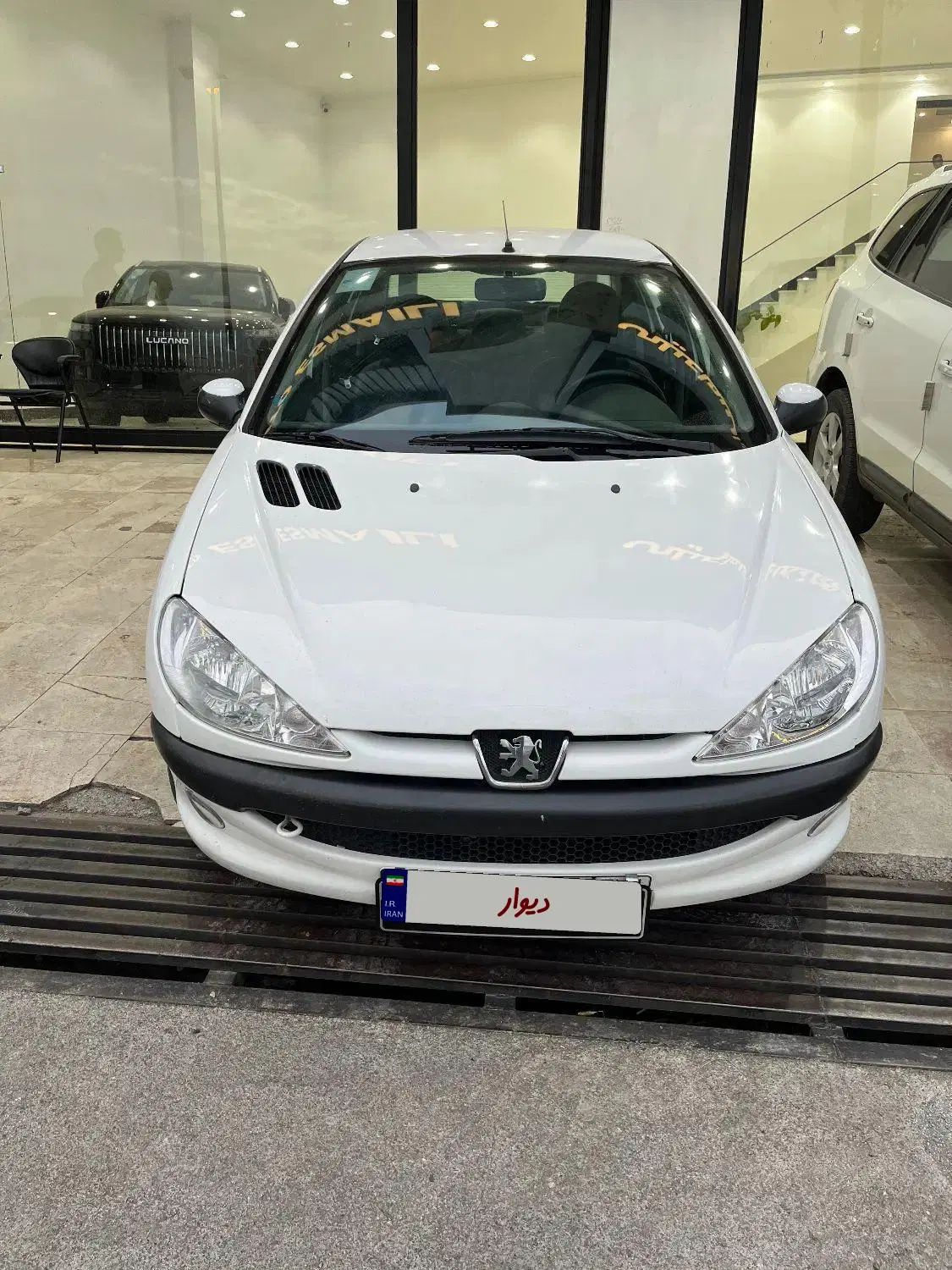 پژو ۲۰۶ صندوق دار v8 - 1397