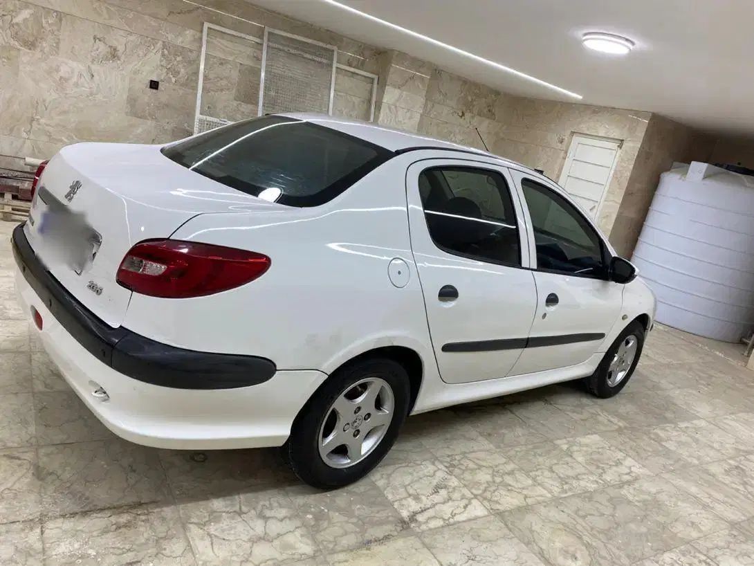 پژو ۲۰۶ صندوق دار v8 - 1391