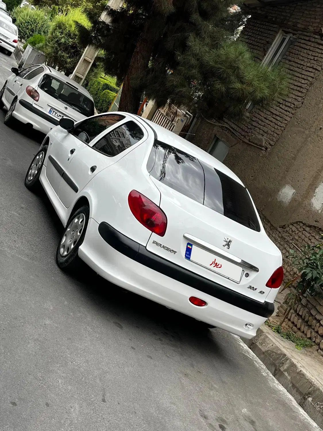پژو ۲۰۶ صندوق دار v8 - 1400