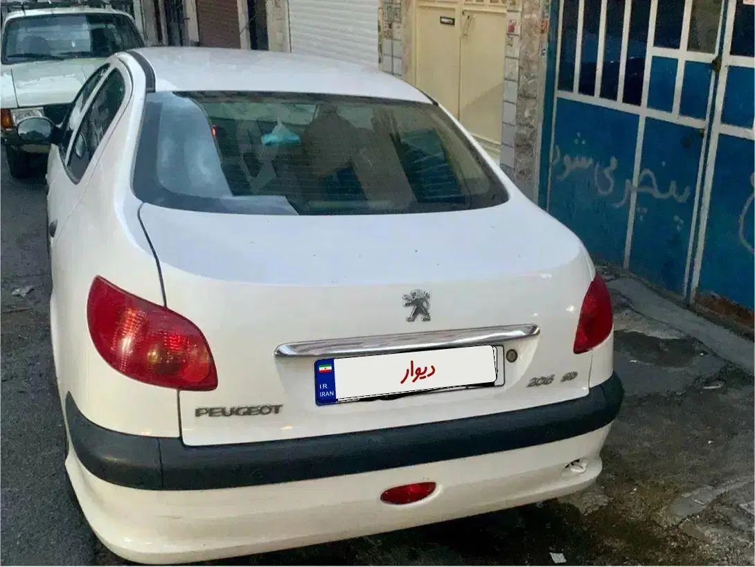 پژو ۲۰۶ صندوق دار v8 - 1396