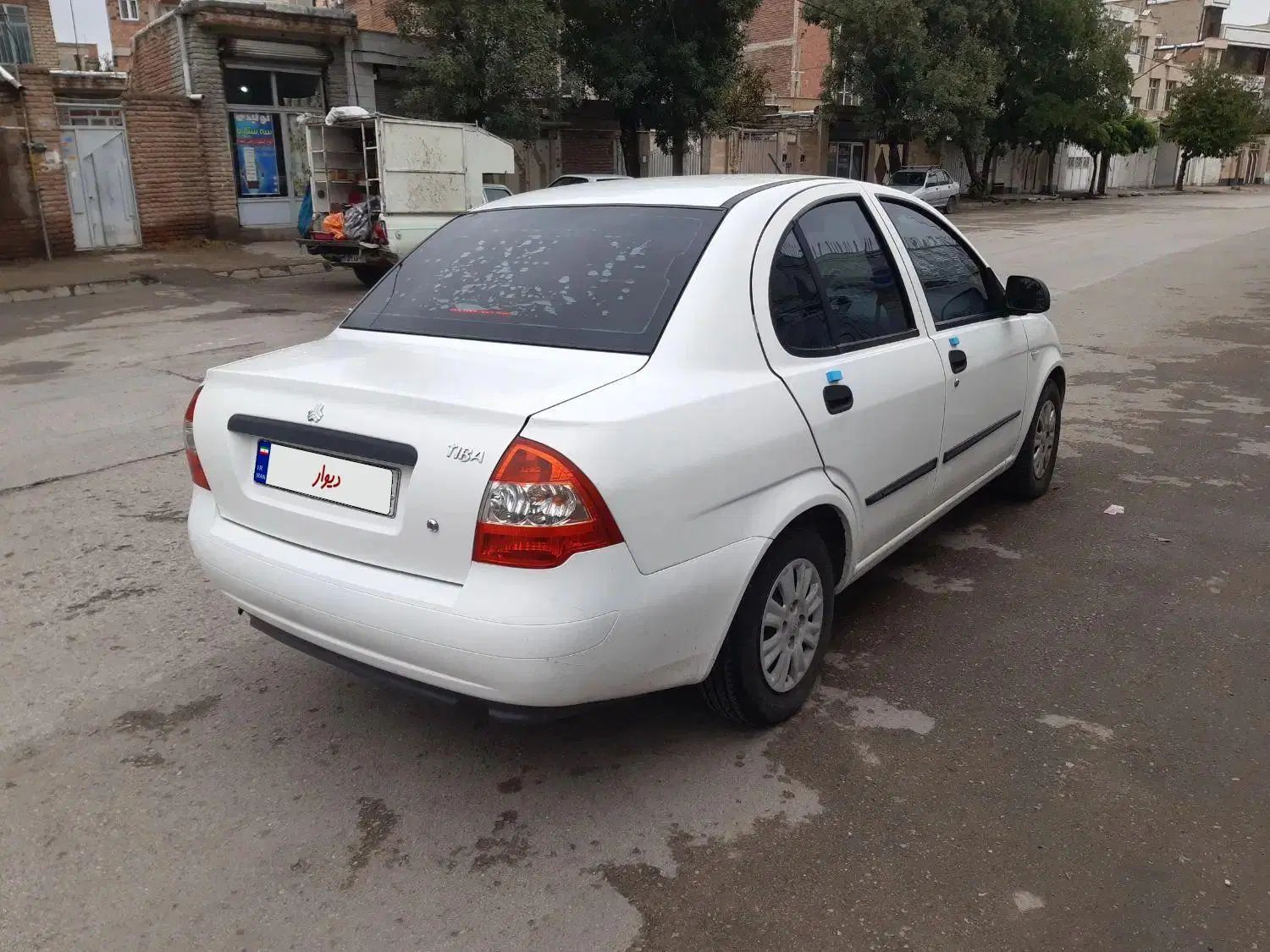 تیبا صندوق دار SX - 1401