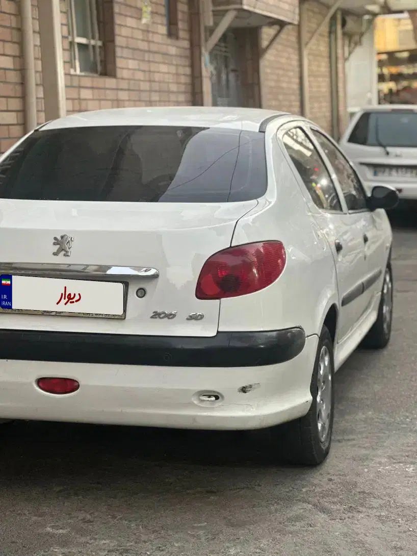 پژو ۲۰۶ صندوق دار v8 - 1396