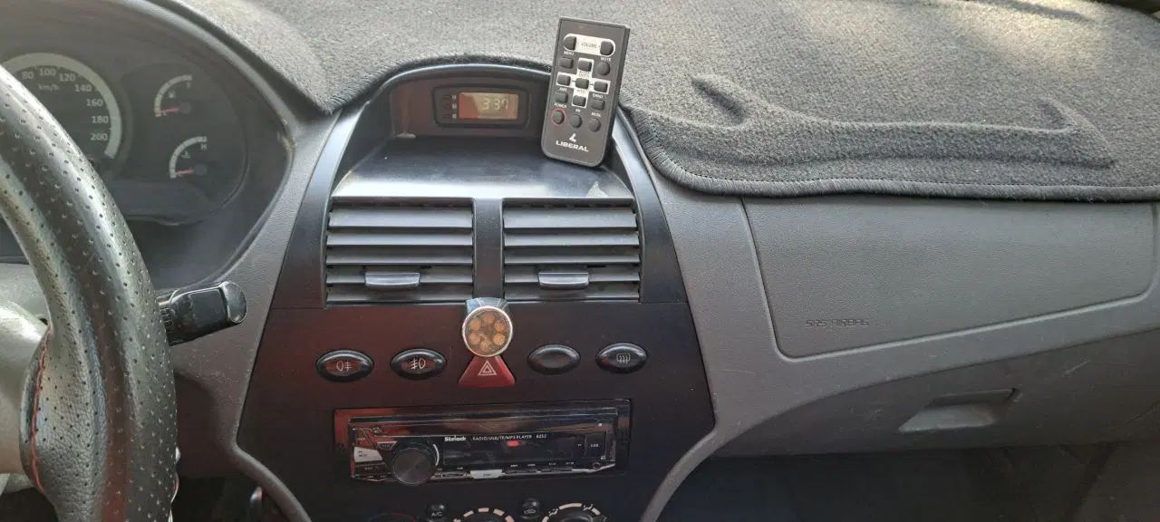 تیبا صندوق دار SX - 1392