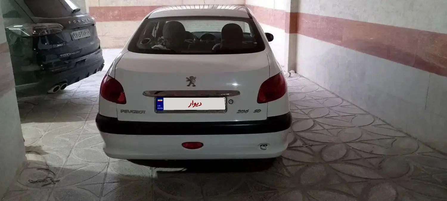 پژو ۲۰۶ صندوق دار v8 - 1397