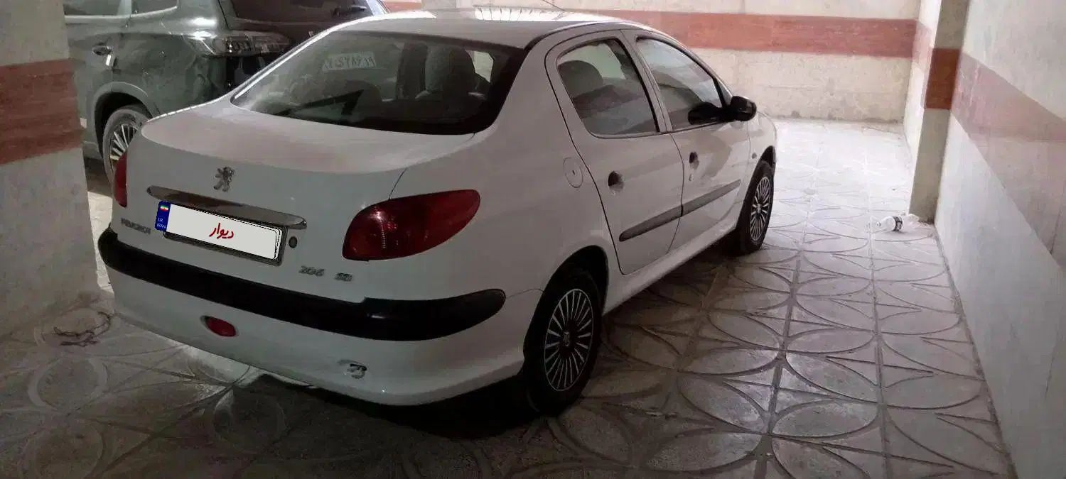 پژو ۲۰۶ صندوق دار v8 - 1397