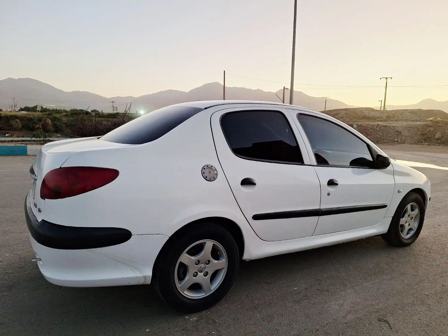 پژو ۲۰۶ صندوق دار v8 - 1394