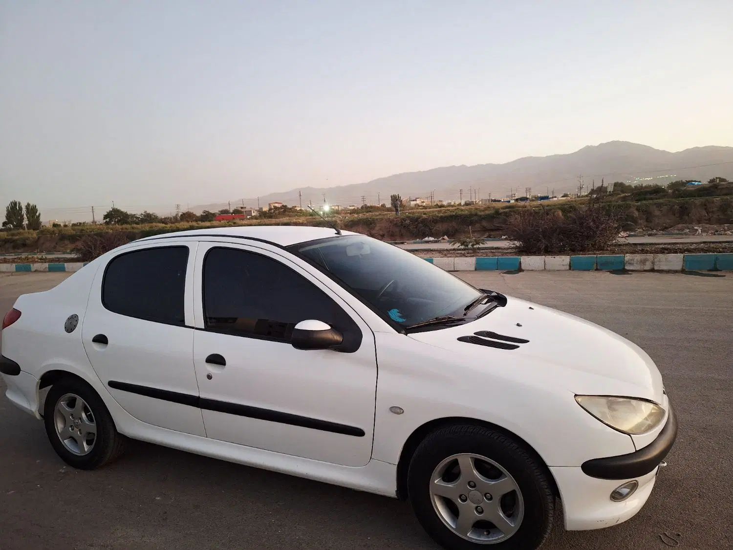 پژو ۲۰۶ صندوق دار v8 - 1394
