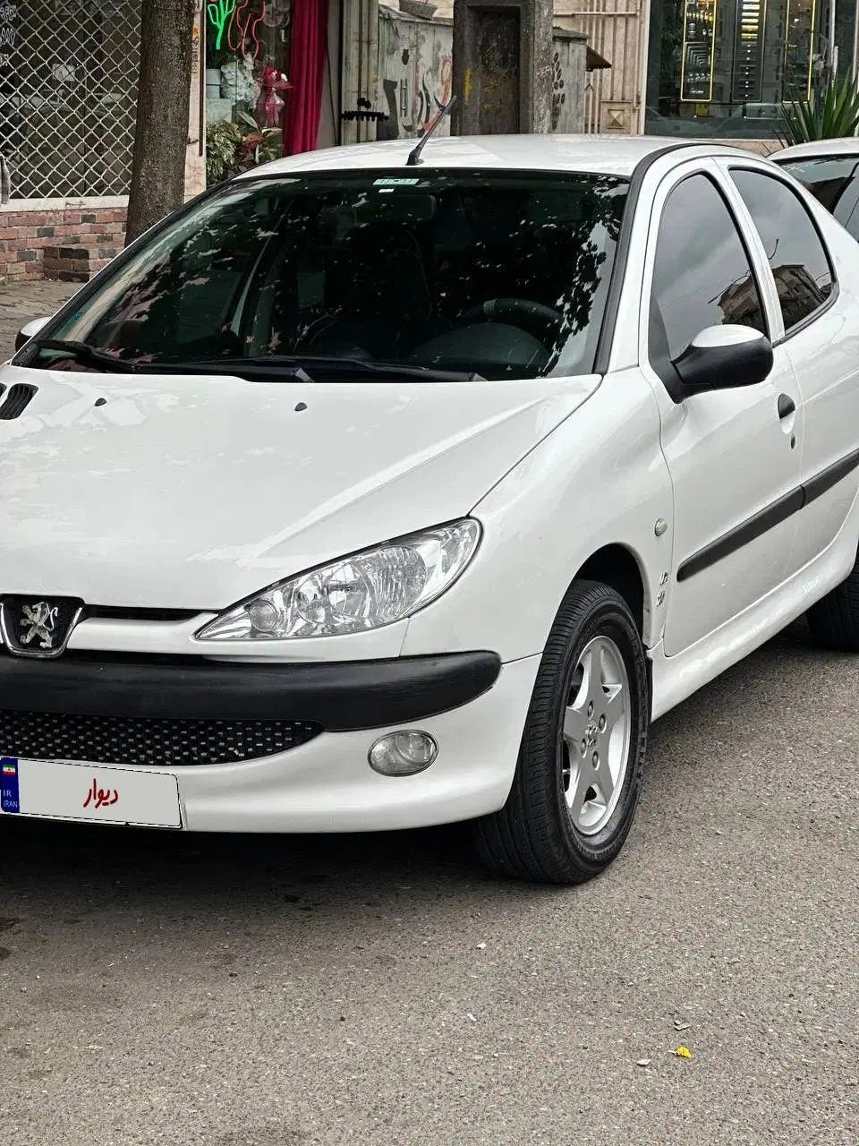 پژو ۲۰۶ صندوق دار v8 - 1395