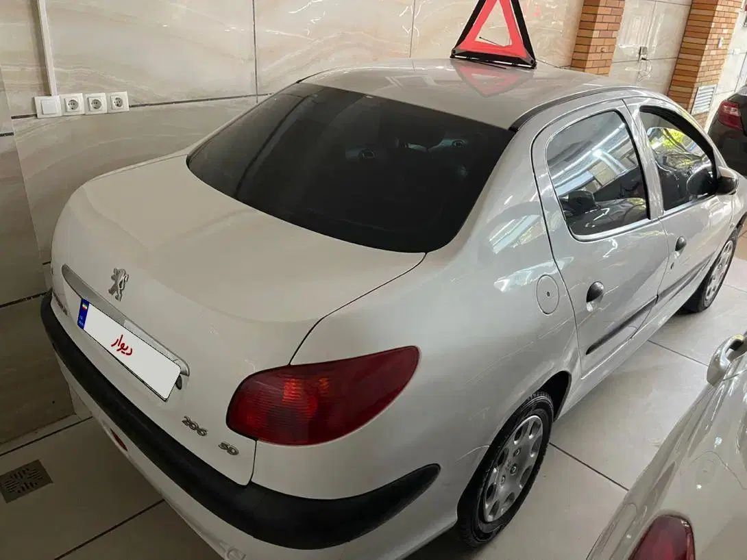 پژو ۲۰۶ صندوق دار v8 - 1396