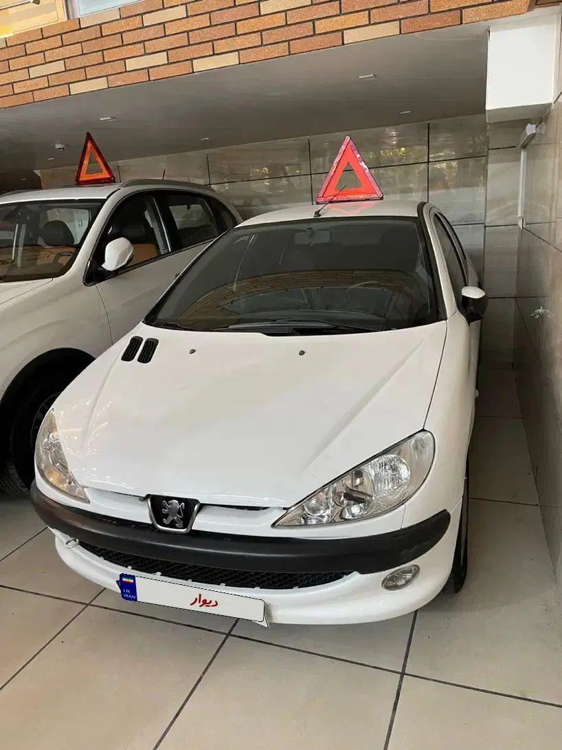 پژو ۲۰۶ صندوق دار v8 - 1396
