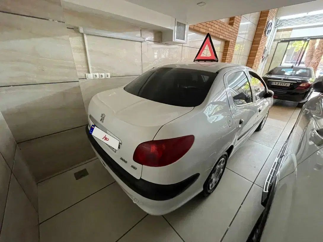 پژو ۲۰۶ صندوق دار v8 - 1396