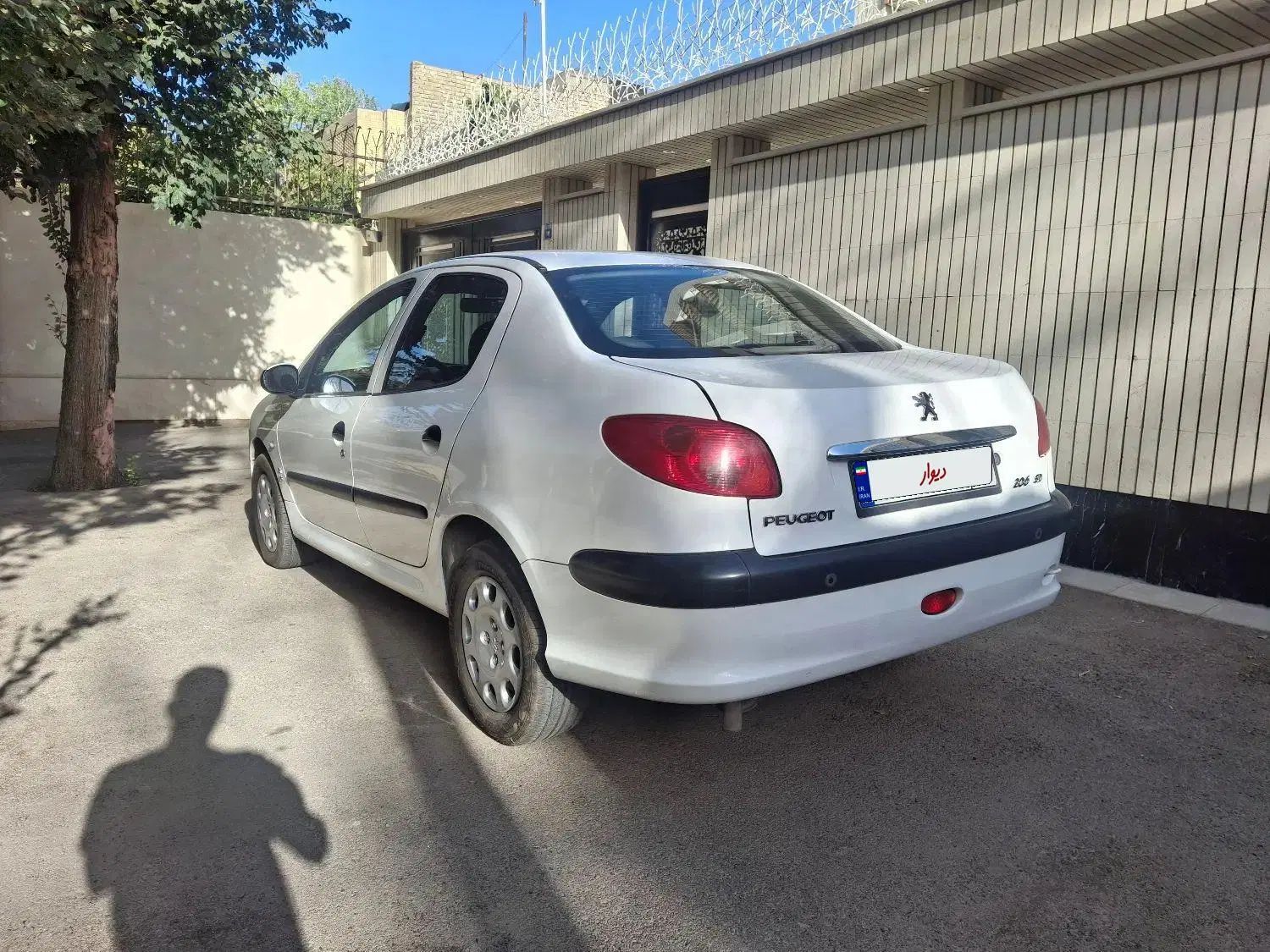 پژو ۲۰۶ صندوق دار v8 - 1396