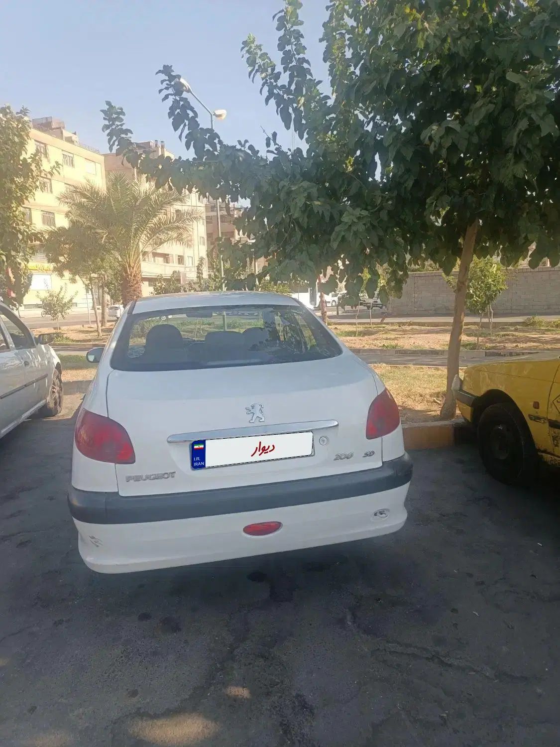 پژو ۲۰۶ صندوق دار v8 - 1399
