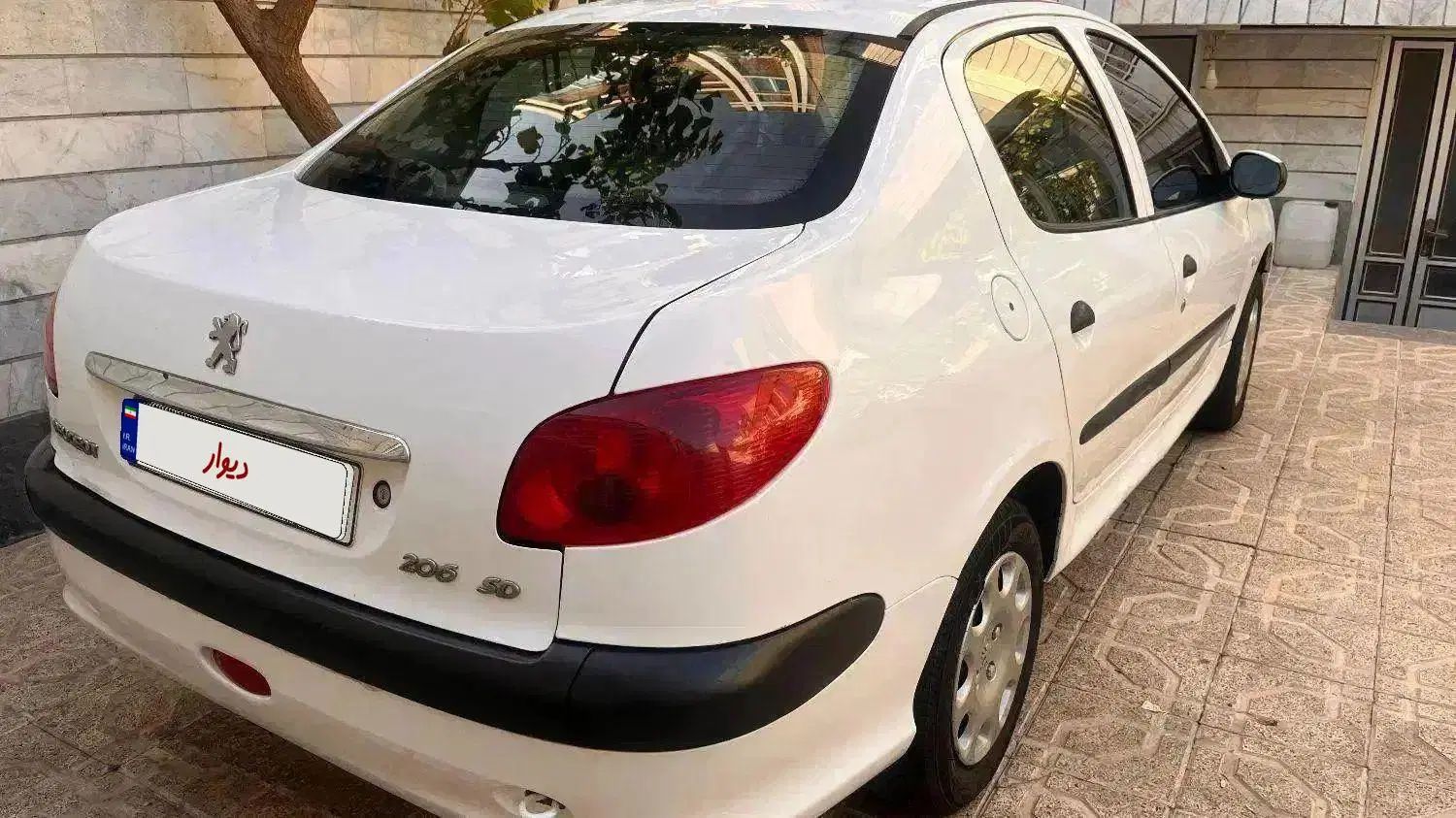پژو ۲۰۶ صندوق دار v8 - 1391