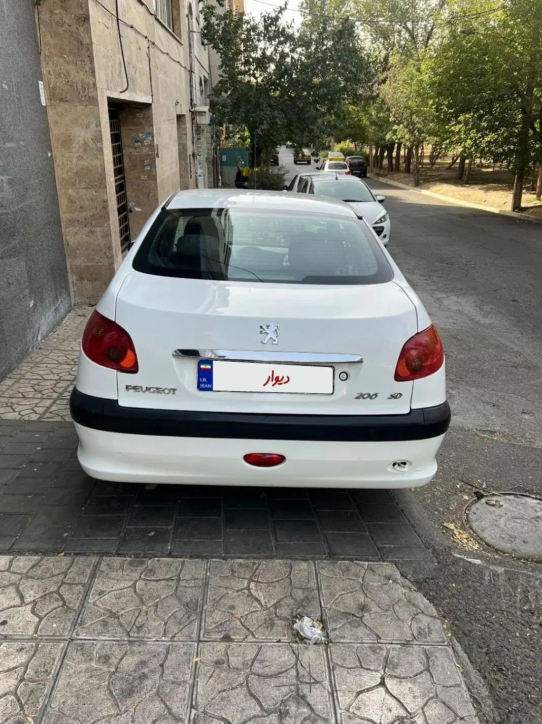 پژو ۲۰۶ صندوق دار v8 - 1396
