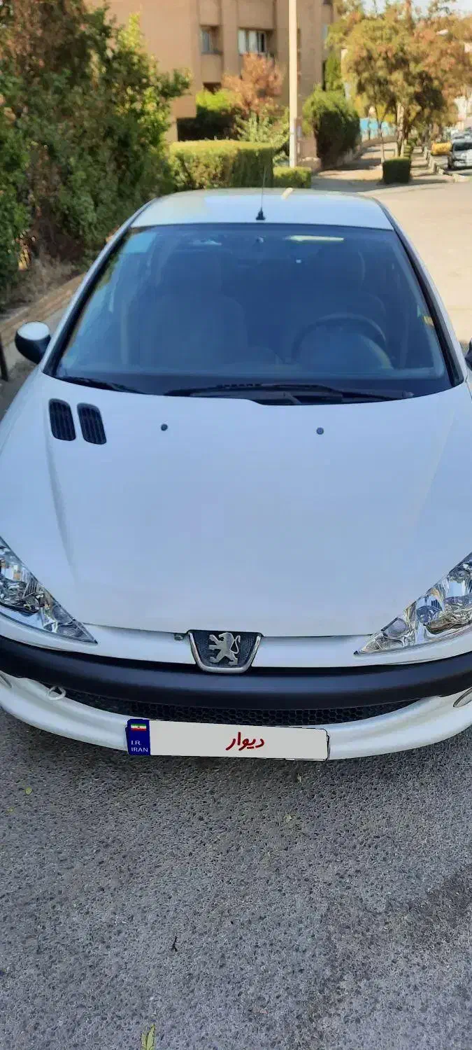 پژو ۲۰۶ صندوق دار v8 - 1396