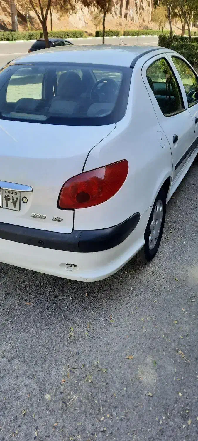 پژو ۲۰۶ صندوق دار v8 - 1396