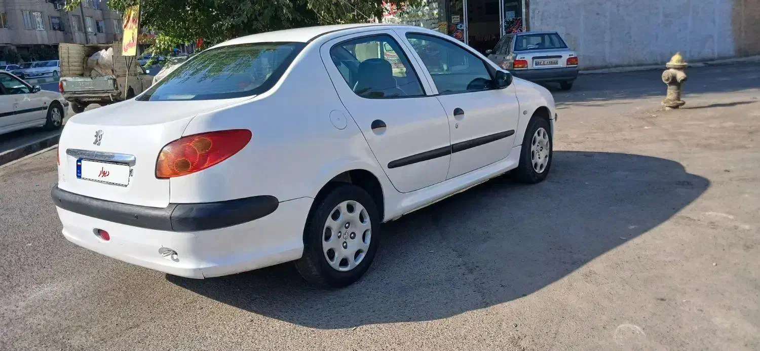 پژو ۲۰۶ صندوق دار v8 - 1396