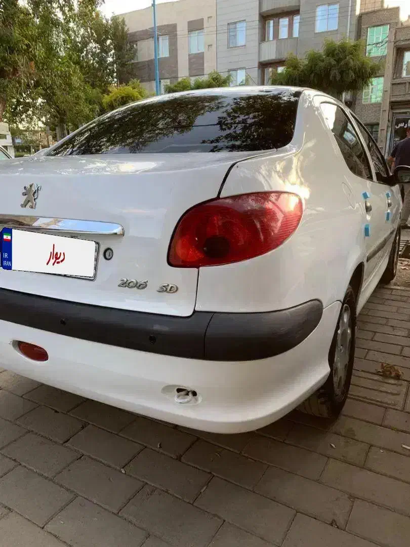 پژو ۲۰۶ صندوق دار v8 - 1391
