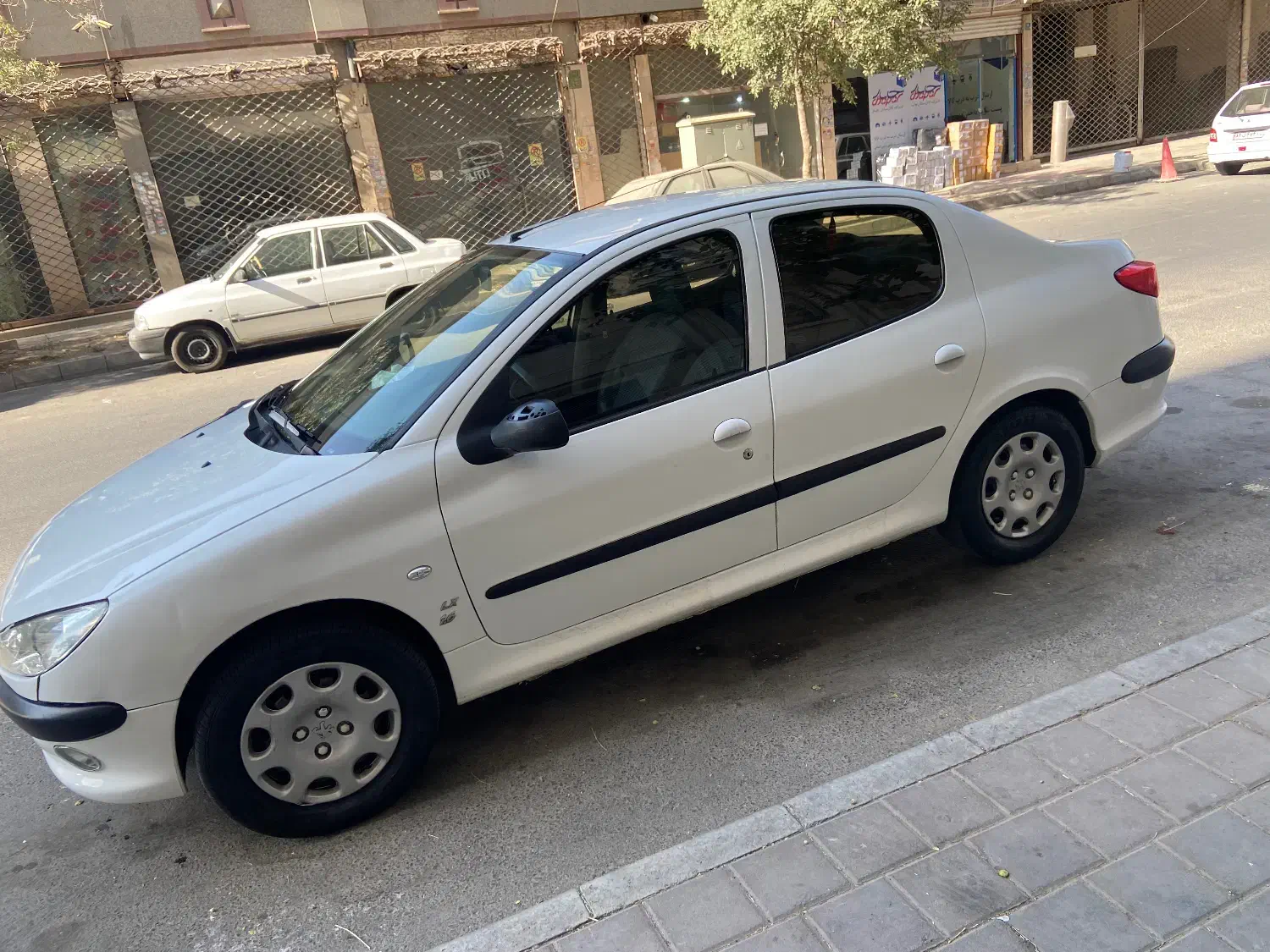 پژو ۲۰۶ صندوق دار v8 - 1395