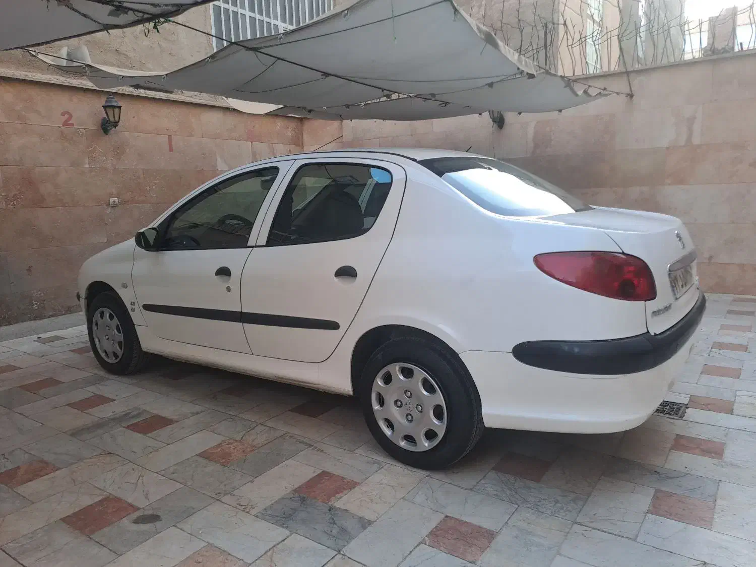 پژو ۲۰۶ صندوق دار v8 - 1396
