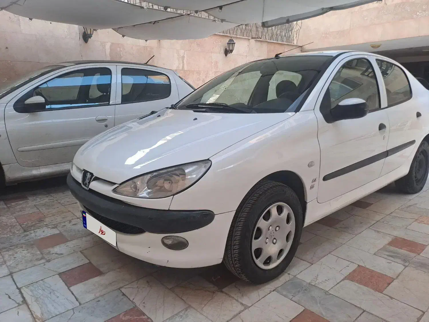 پژو ۲۰۶ صندوق دار v8 - 1396