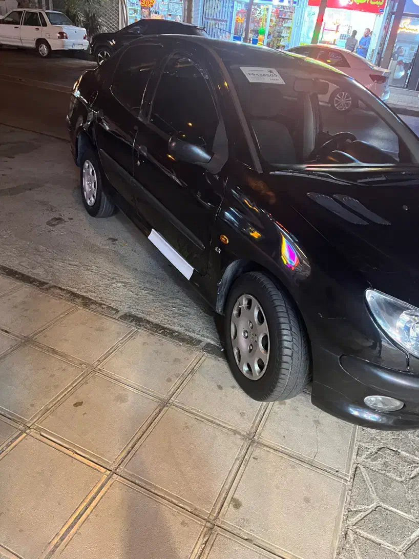 پژو ۲۰۶ صندوق دار v8 - 1391