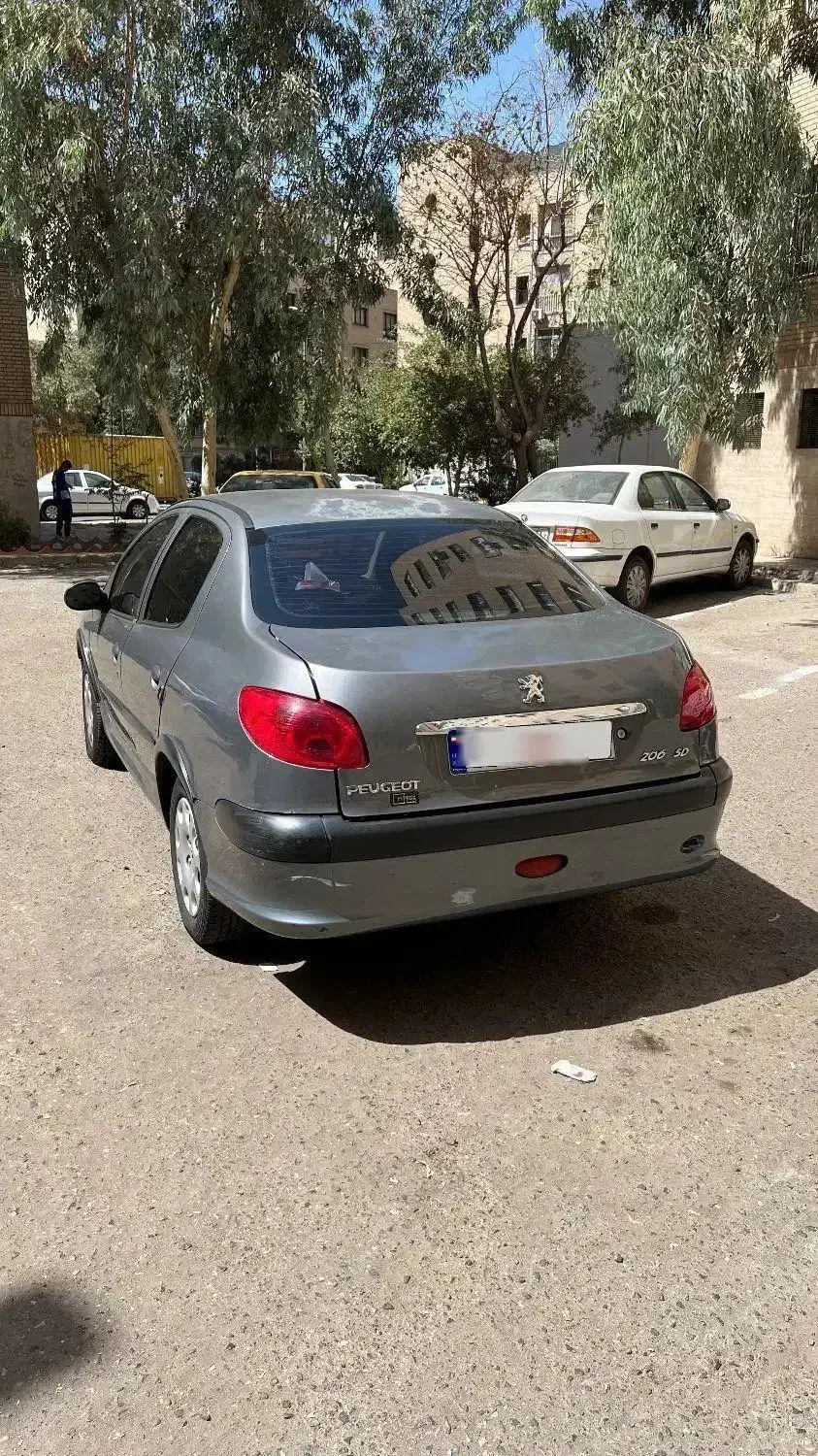 پژو ۲۰۶ صندوق دار v8 - 1391
