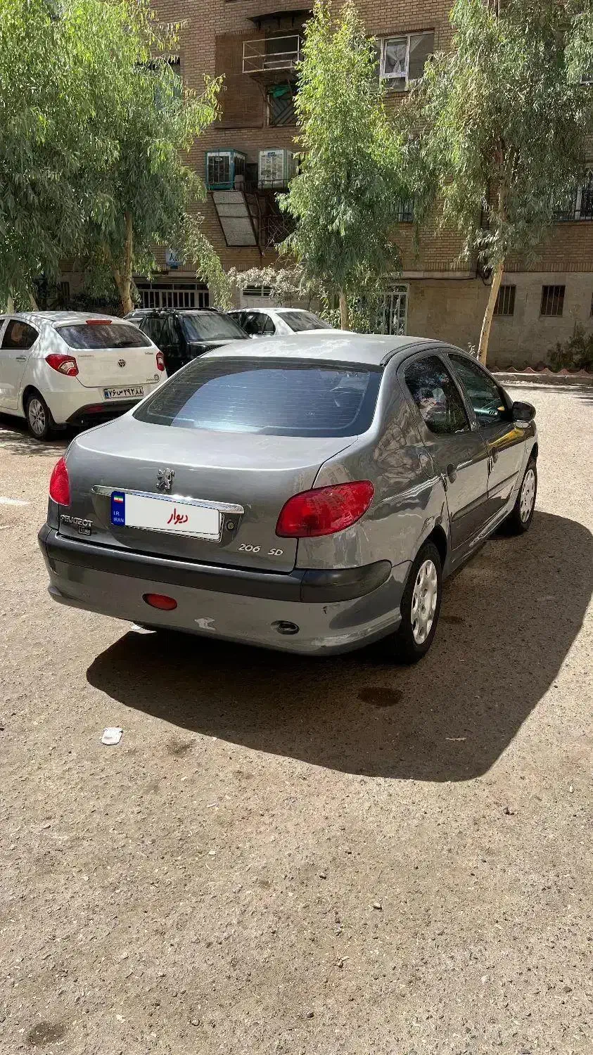 پژو ۲۰۶ صندوق دار v8 - 1391