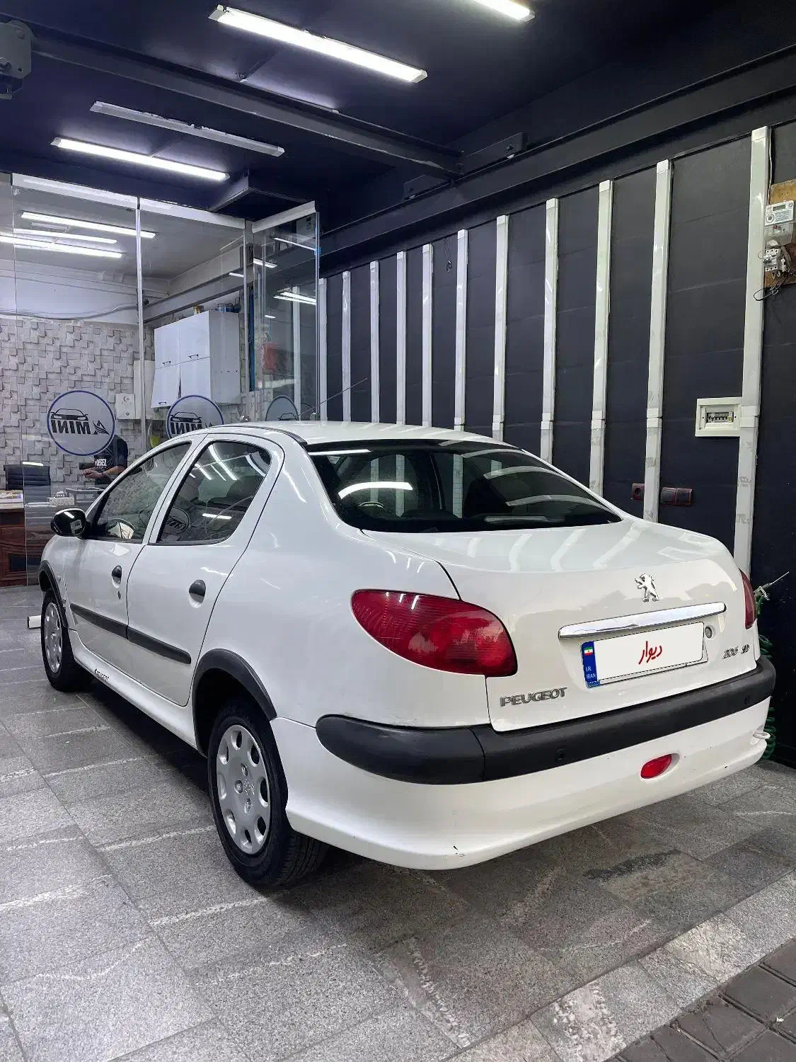 پژو ۲۰۶ صندوق دار v8 - 1396